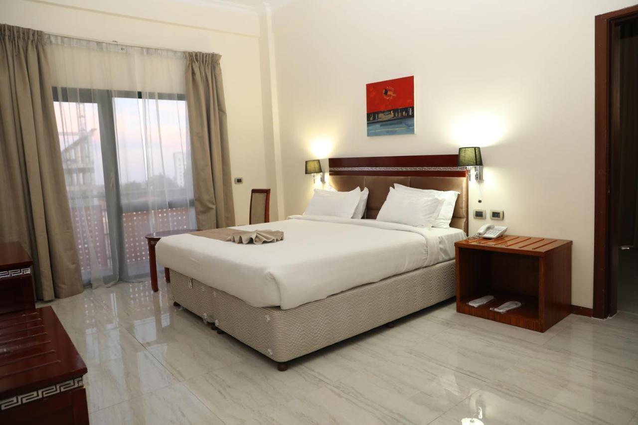 Kenenisa Hotel Addis-Abeba Extérieur photo